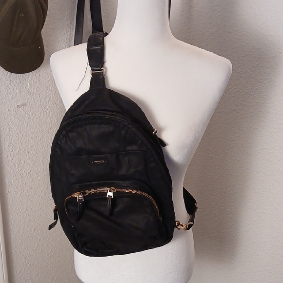 Tumi Black Belt Bag with Gold Accents